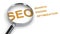 SEO, Search Engine Optimization, word under magnifying glass