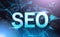 Seo Sign Over Futuristic Low Poly Mesh Wireframe On Blue Background Content Optimization Concept