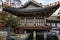 Seoul, South Korea, 01/05/2018: Beautiful wooden pagoda with a goldfish pond in a park in the city center. Close-up