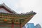 SEOUL / SOUTH KOREA - JUNE 24, 2013: Traditional temple with modern skyscraper in background - Historic culture and economic futur