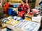 Seoul, South Korea - June 26, 2017: Woman fish seller waits for buyers at Gwangjang Market in Seoul