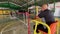 Sepak Takraw Umpire Chair seated referee officiating the foot volleyball sporting event