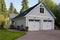 separate garage with matching gambrel roof