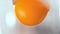 Separated Egg Yolk Falling out of Halved Eggshell in Macro 1000 FPS (Phantom Flex)