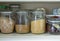 Separation in a kitchen cupboard or pantry with cereals and canned goods
