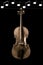 Sepia of a cello on a black background