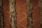 Sepia colour tone old rusty balustrade and wood background