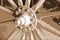 SEPIA IMAGE OF OLD WHEEL AND HUB