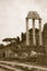 Sepia image of Temple of Castor & Pollux at Roman Forum seen from the Capitol, ancient Roman ruins, Rome, Italy, Europe