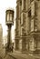 Sepia lamp and gothic building