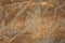 Sepia toned natural hill stone texture background.