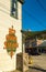 September 15, 2018 - Skagway, AK: Side view of The Red Onion Saloon and public cigarette disposal bin from 2nd Ave.