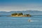 September 17, 2018 - Tongass Narrows, AK: Aluminum fishing boat near Guard Islands and lighthouse, early morning.