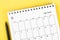 September 2022 desk calendar on yellow background