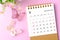 A September 2023 desk calendar for the organizer to plan and reminder and paer butterfly on pink colour background