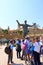 September 29 2022 - Pretoria, South Africa: Happy Children at the Nelson Mandela statue on his square in front of Union Buildings