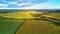 September agriculture fields aerial panorama. Sunny autumn landscape