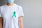 September Ovarian cancer Awareness month, Woman with teal Ribbon color for supporting people living, and illness. Healthcare and