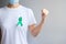 September Ovarian cancer Awareness month, Woman with teal Ribbon color for supporting people living, and illness. Healthcare and