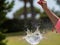 Sequence in several photos of the launch of a dart against a water-filled balloon and its subsequent explosion