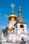 Seraphim of Sarov temple against the blue sky in summer in the Northern Park of Khabarovsk