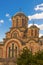Serbia Belgrade March 2019. Church of St. Mark is the main landmark of the city vertical photo against a blue sky
