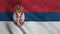 Serbia flag waving in the wind with high quality texture. National flag of Serbia