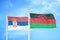 Serbia and Malawi two flags on flagpoles and blue sky