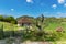 Serbian household on the mountain. Village house and wooden fence