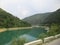 Serbian landscape with green Pond water seen through the Sightseeing Bus window