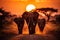 Serene african savannah. magnificent elephants roaming free under the golden sunset