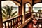 serene balcony with view of the ocean, surrounded by tranquil sounds and warm breezes