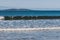 Serene beach with gentle ocean waves shot in southern Tasmania