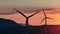 Serene Beauty from Above: Captivating Aerial Footage of Windmills at Twilight,