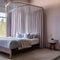 A serene bedroom with soft pastel hues, sheer curtains, and a cozy canopy bed for a dreamy atmosphere5, Generative AI