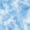 Serene Blue Sky with Fluffy Clouds Texture Background