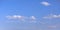 Serene blue sky with puffy clouds at Daybreak Utah