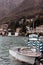 Serene boat floating on the tranquil waters of Lake Como in Italy.