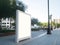 Serene boating along a modern streetscape of parks and pride Blank empty billboard mock up. AI generation