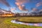 Serene Creek with Blurred Clouds