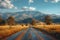 A serene drive through a picturesque countryside road with mountain views.. AI generated.