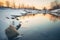 serene dusk light on a half icy-half flowing river