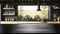 Serene empty black dining table in front of elegantly defocused state-of-the-art kitchen interior