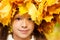 Serene girl with an autumn headwreath