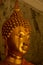 Serene golden Buddha statue