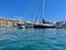 Serene Horizon Multiple Yachts Parked in Docks with Reflecting Water