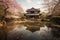 Serene Japanese Garden and Traditional House. Generative AI