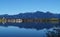 serene lake Bannwaldsee in Schwangau with Bavarian Alps in background on sunny November day (Allgaeu, Bavaria, Germany)