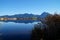 serene lake Bannwaldsee in Schwangau with Bavarian Alps in background on sunny November day (Allgaeu, Bavaria, Germany)