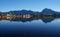 serene lake Bannwaldsee in Schwangau with Bavarian Alps in background on sunny November day (Allgaeu, Bavaria, Germany)